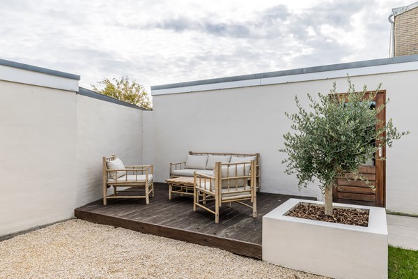 Foto - Verkocht onder voorbehoud: Instapklare gemoderniseerde geschakelde 2 onder 1 kap woning  met aanbouw, open keuken, tuin en garage in Voerendaal